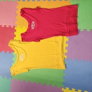 2 Derek heart sleeveless blouses, 1 pink & 1 yellow,  like new,  size medium